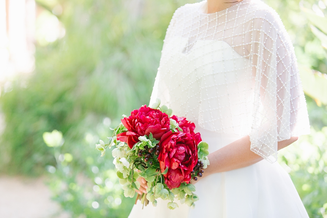 detail of red bridal bouquet