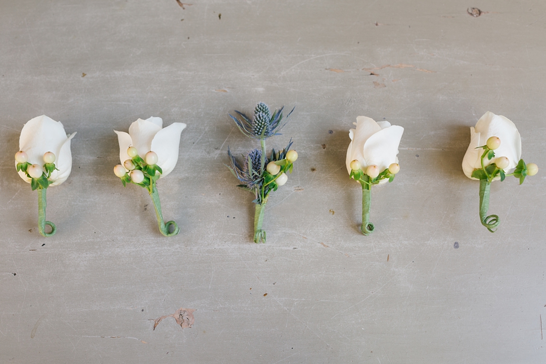 boutonnieres against concrete floor for a clean modern look