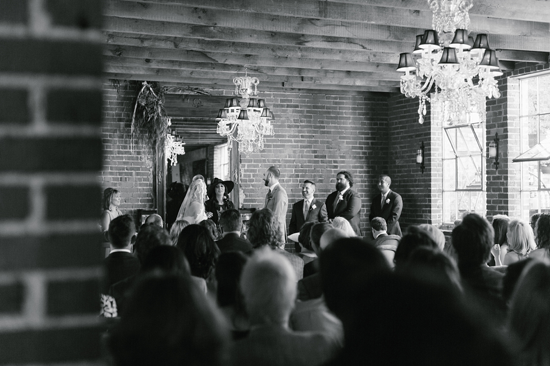 black and white photo of wedding ceremony at carondelet house