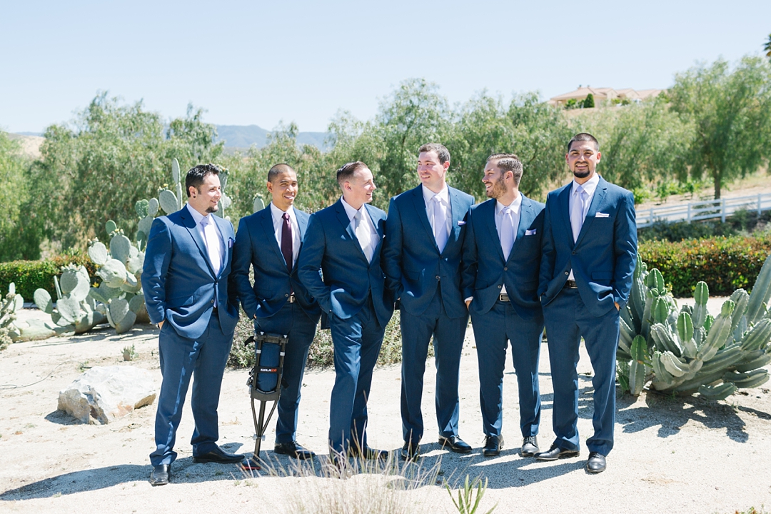 groom and groomsmen looking sharp in blue suits in temecula
