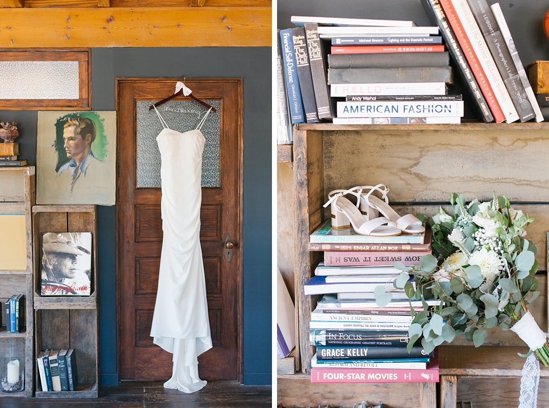 wedding gown hanging in rustic setting 