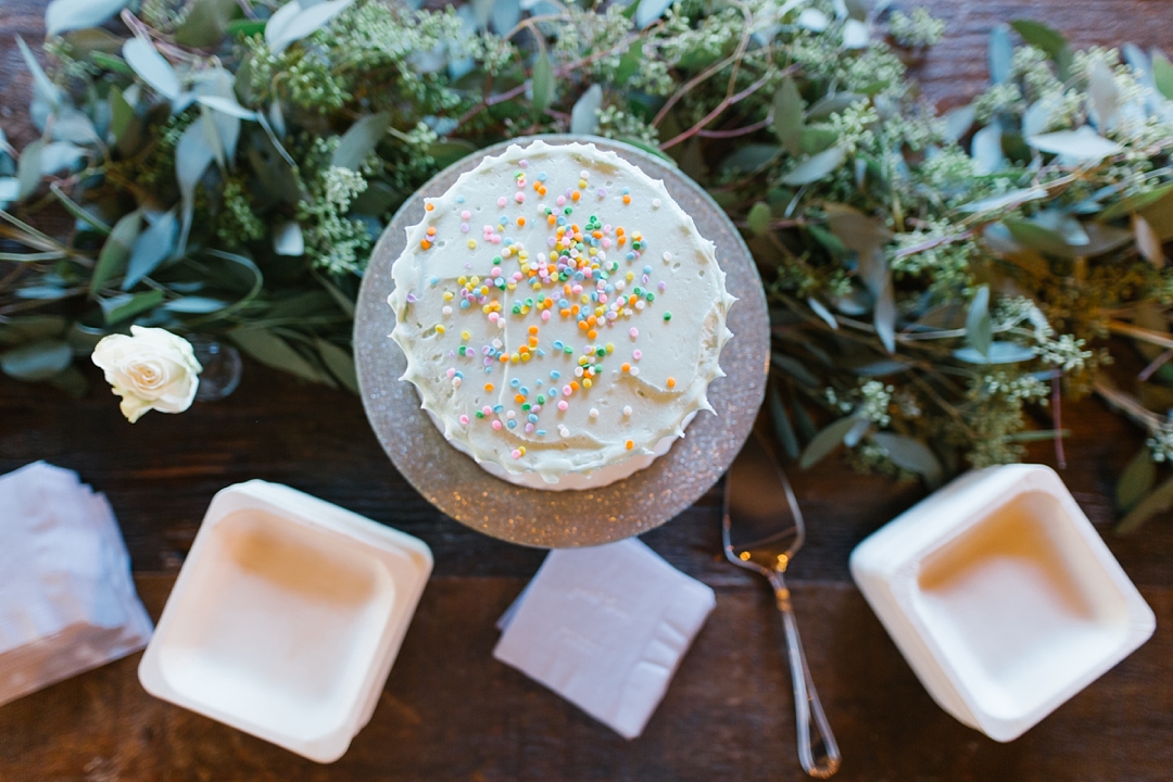 aerial view of blue wedding cake with colorful sprinkles