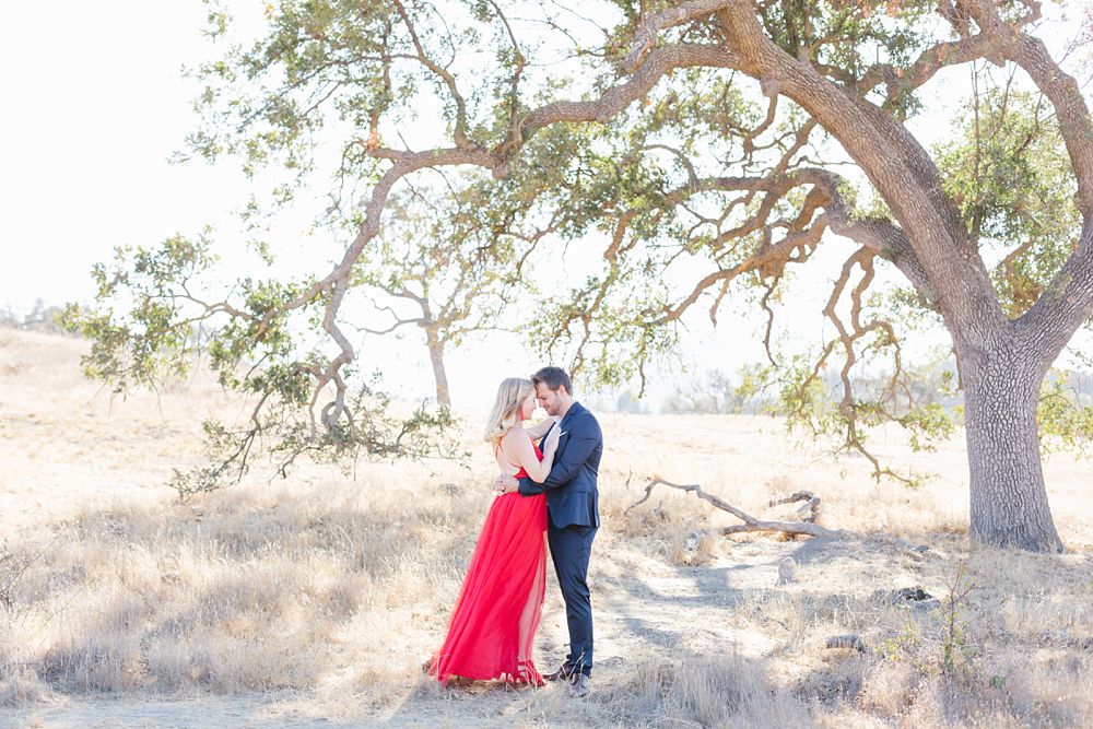 stylish Southern California anniversary session with red dress