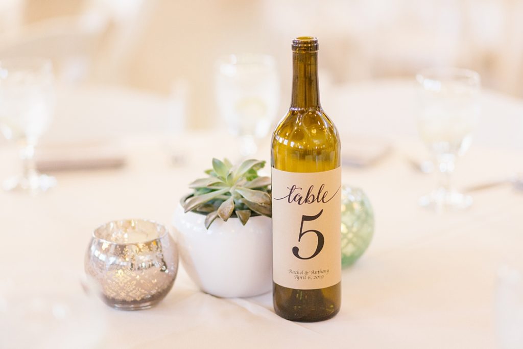 wine bottle table number with succulent center pieces at Center for the Arts Eagle Rock wedding