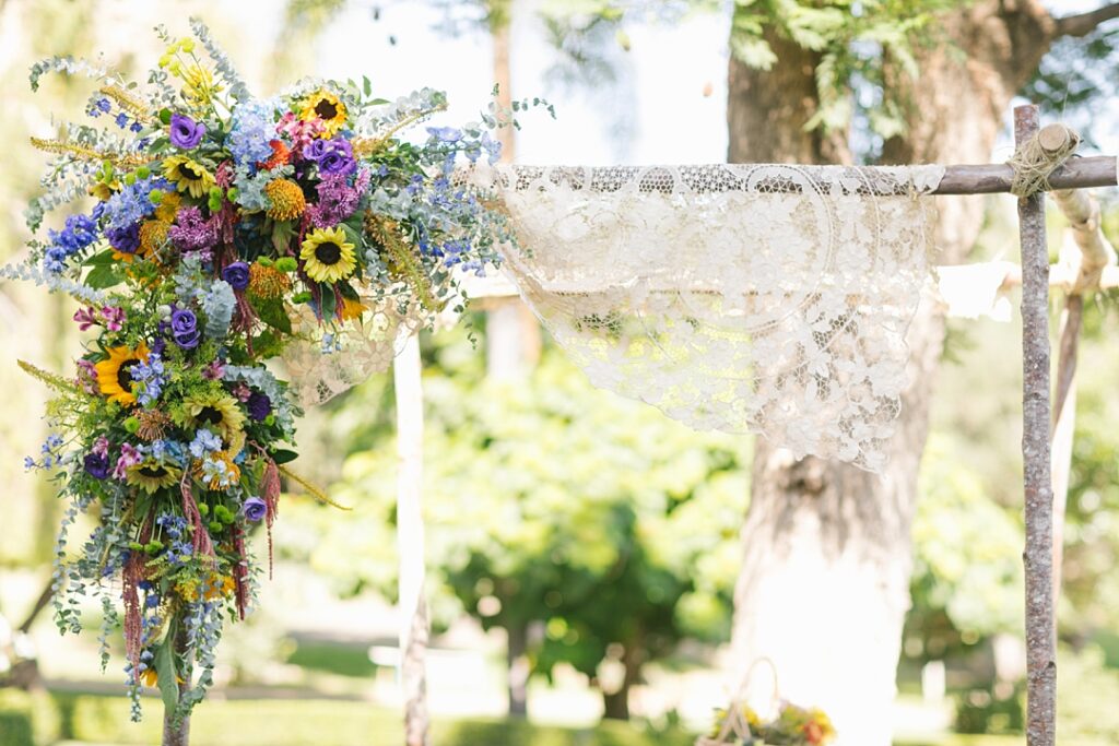 lace and wildflowers on chuppah