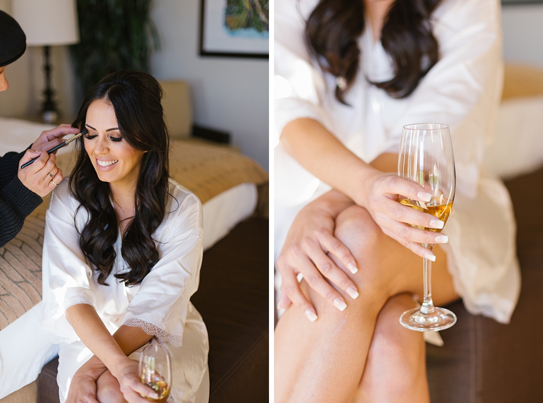 bride sips champagne while getting makeup done at Terranea