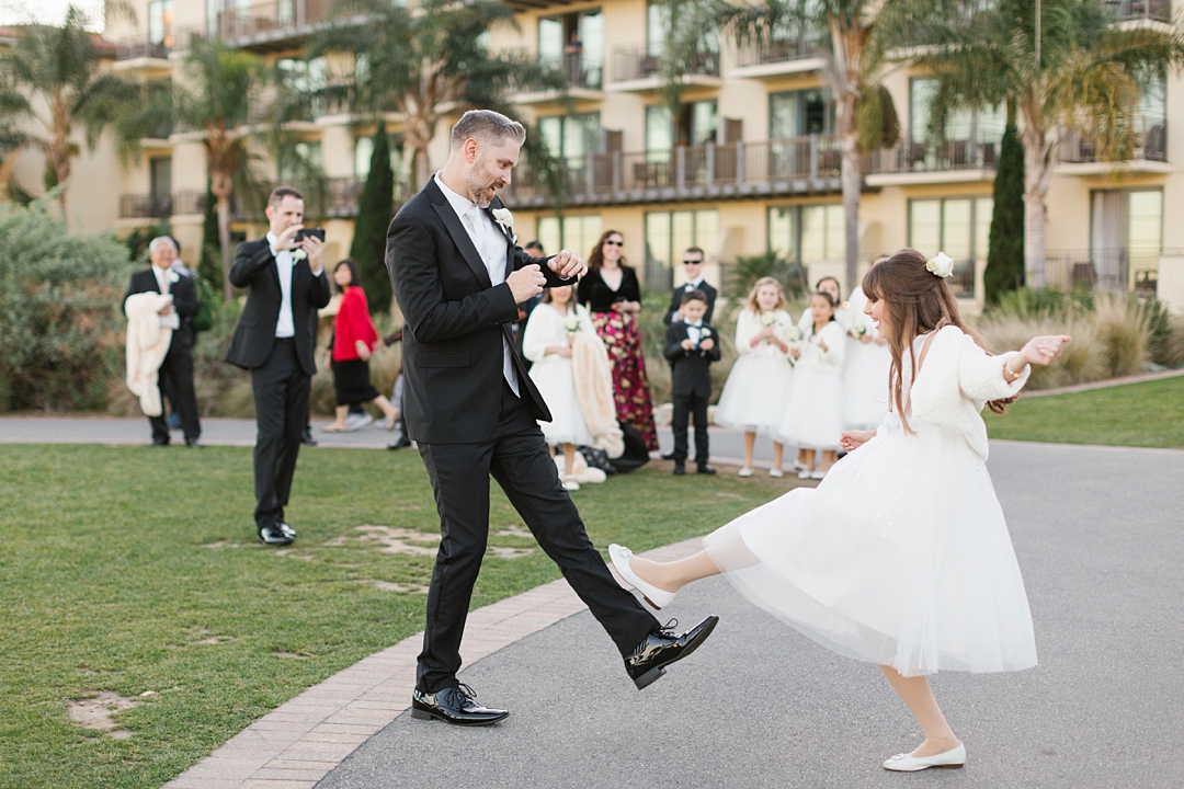 groom and daughter dance off