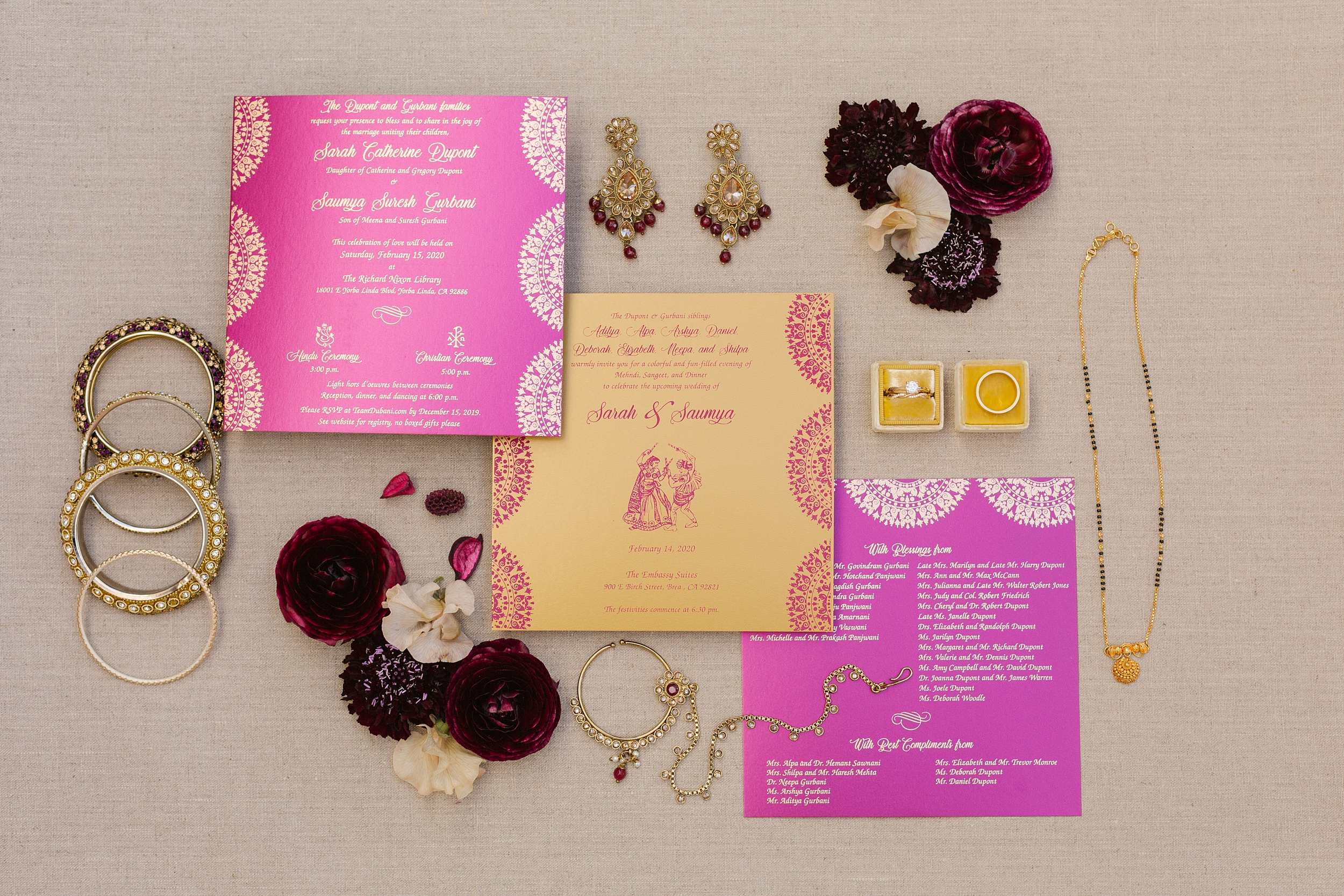 orange county indian wedding invitation suite with bride's jewelry