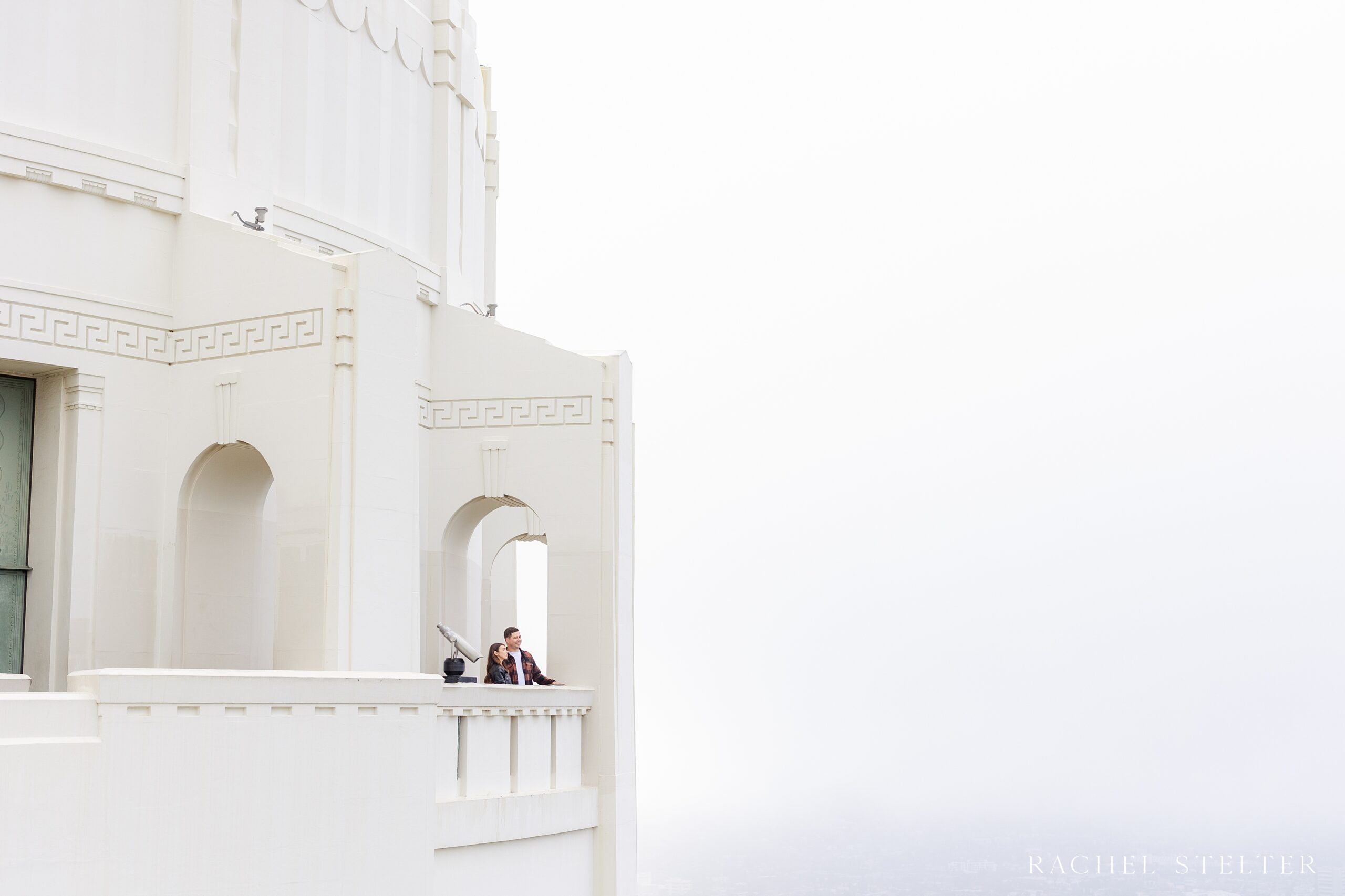 dramatic engagement photo on foggy morning at the Griffith Observatory