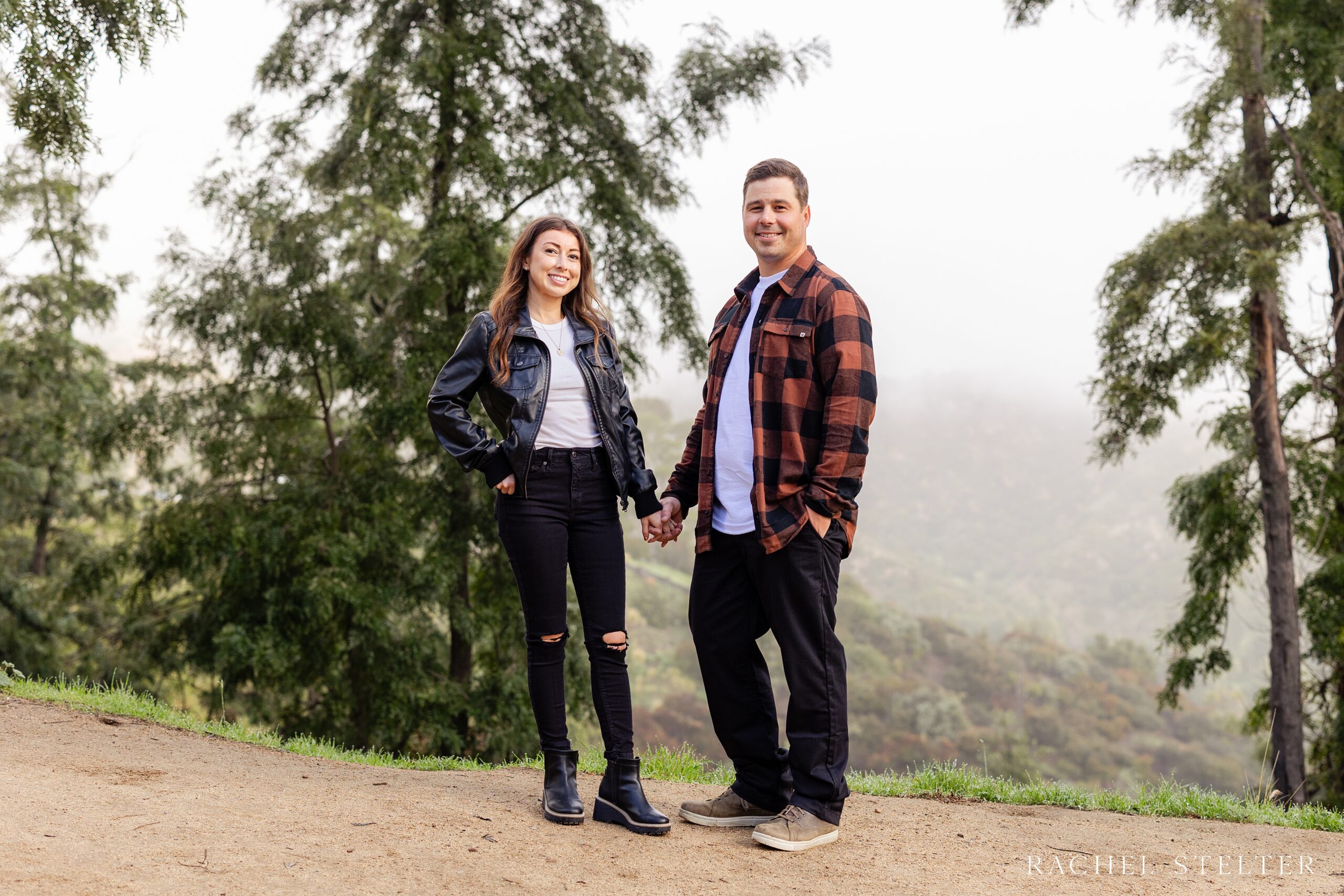 engaged couple poses for portrait on LA nature trail