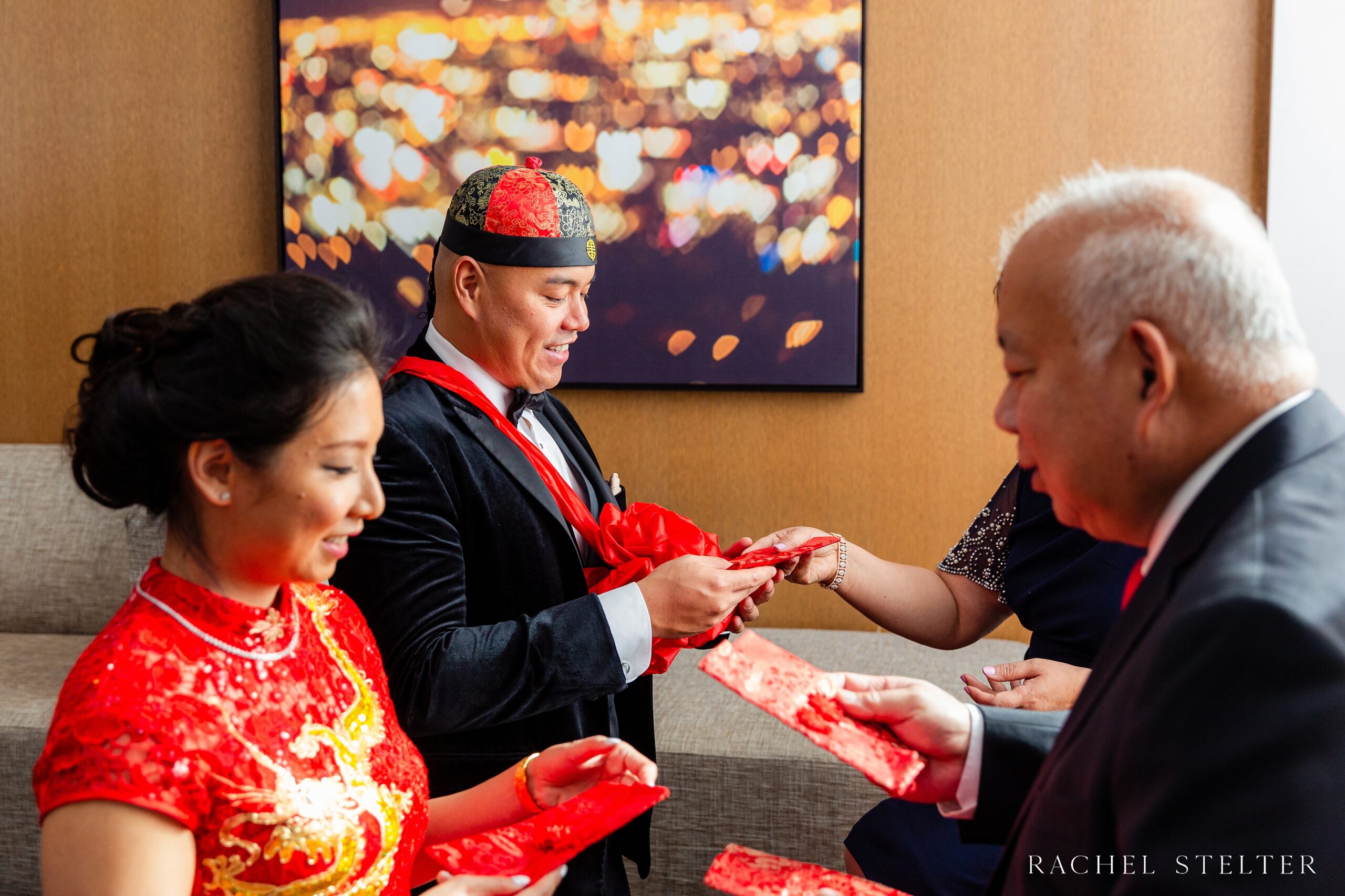 bride and groom receive gifts at their Los Angeles tea ceremony